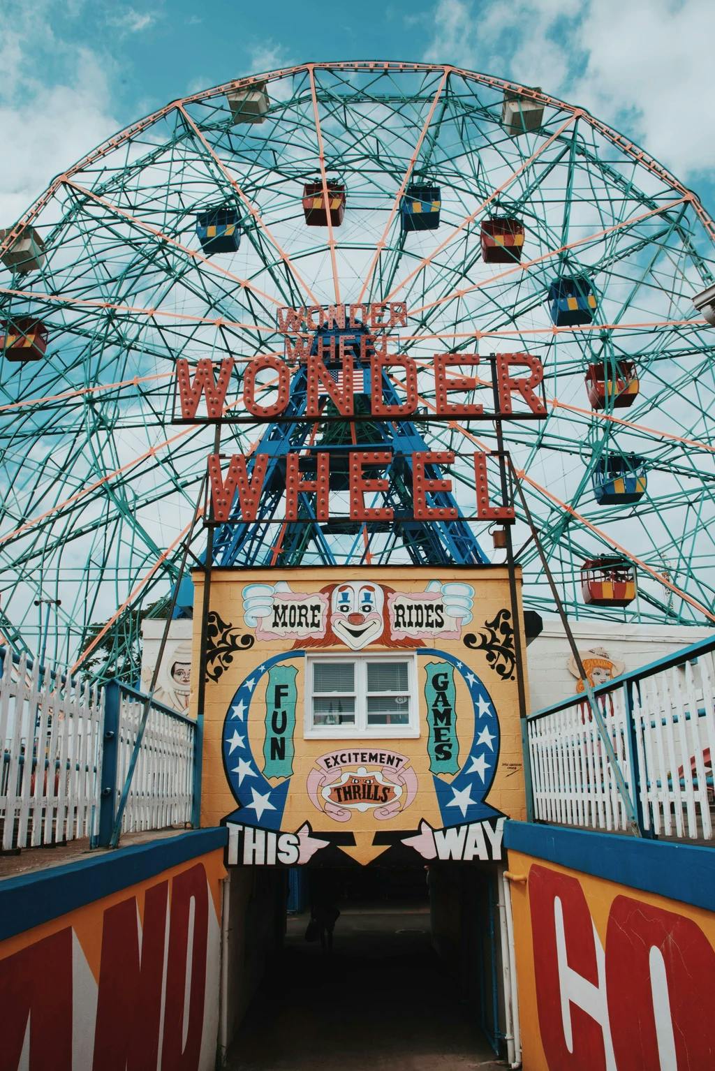 a close up of a ferris wheel at coney island