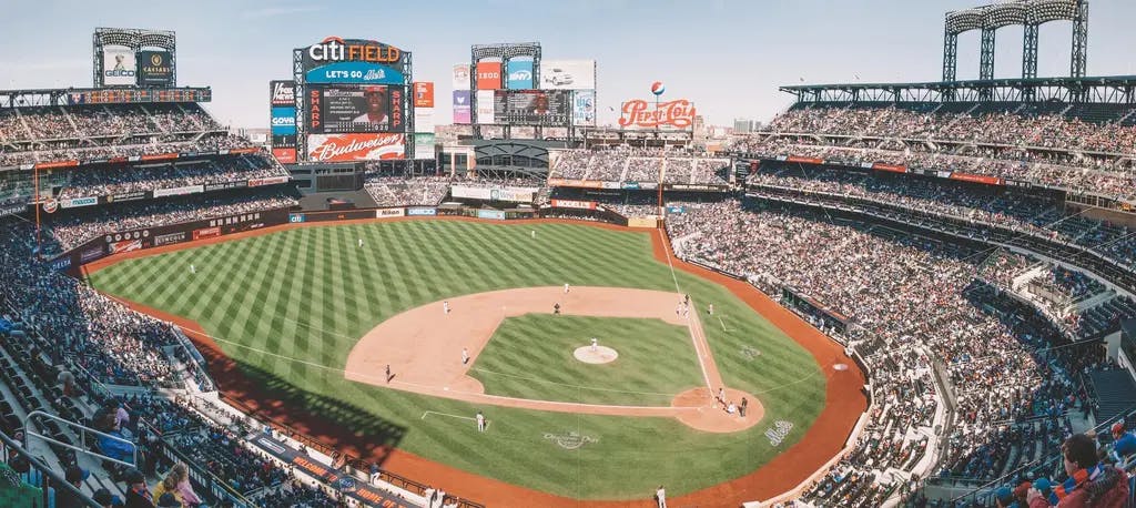 a birds eye view of citi field with a large crowd in the stands