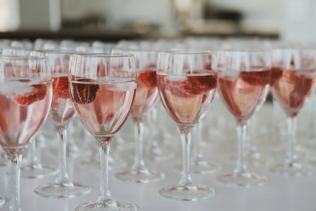 rows of glasses of rose