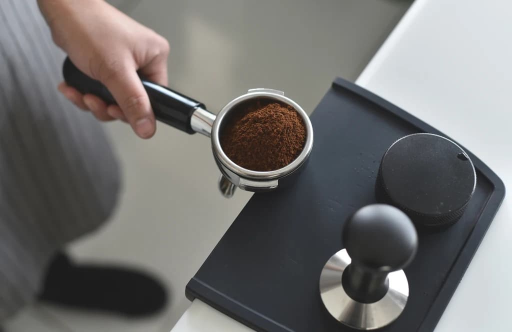 espresso grounds in a cup