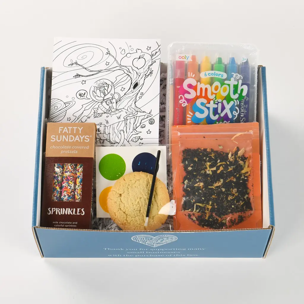 A colorful craft box with markers, tea, a cookie, and pretzels. Included are materials for art projects like coloring, perfect for a creative gift.